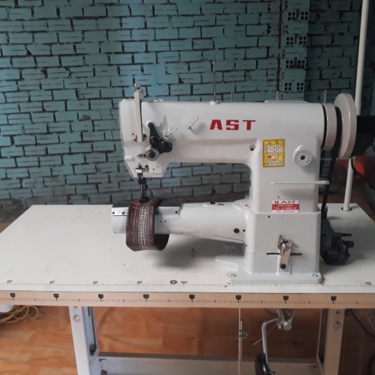 MÁY MAY TÚI LỌC KHÍ AST